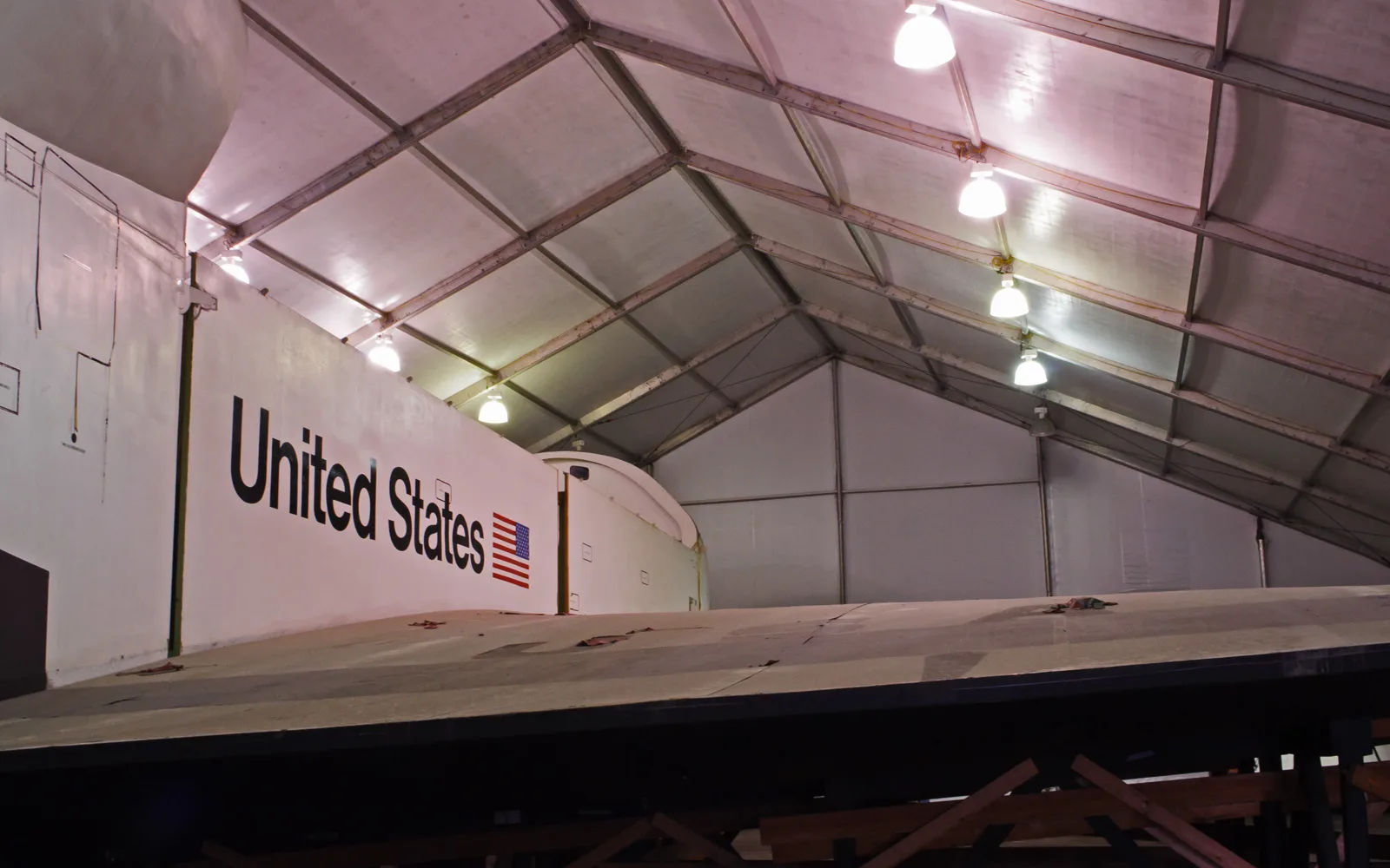 The rear fuselage of the Space Shuttle Inspiration, a spacecraft built in Downey, displayed in a museum setting