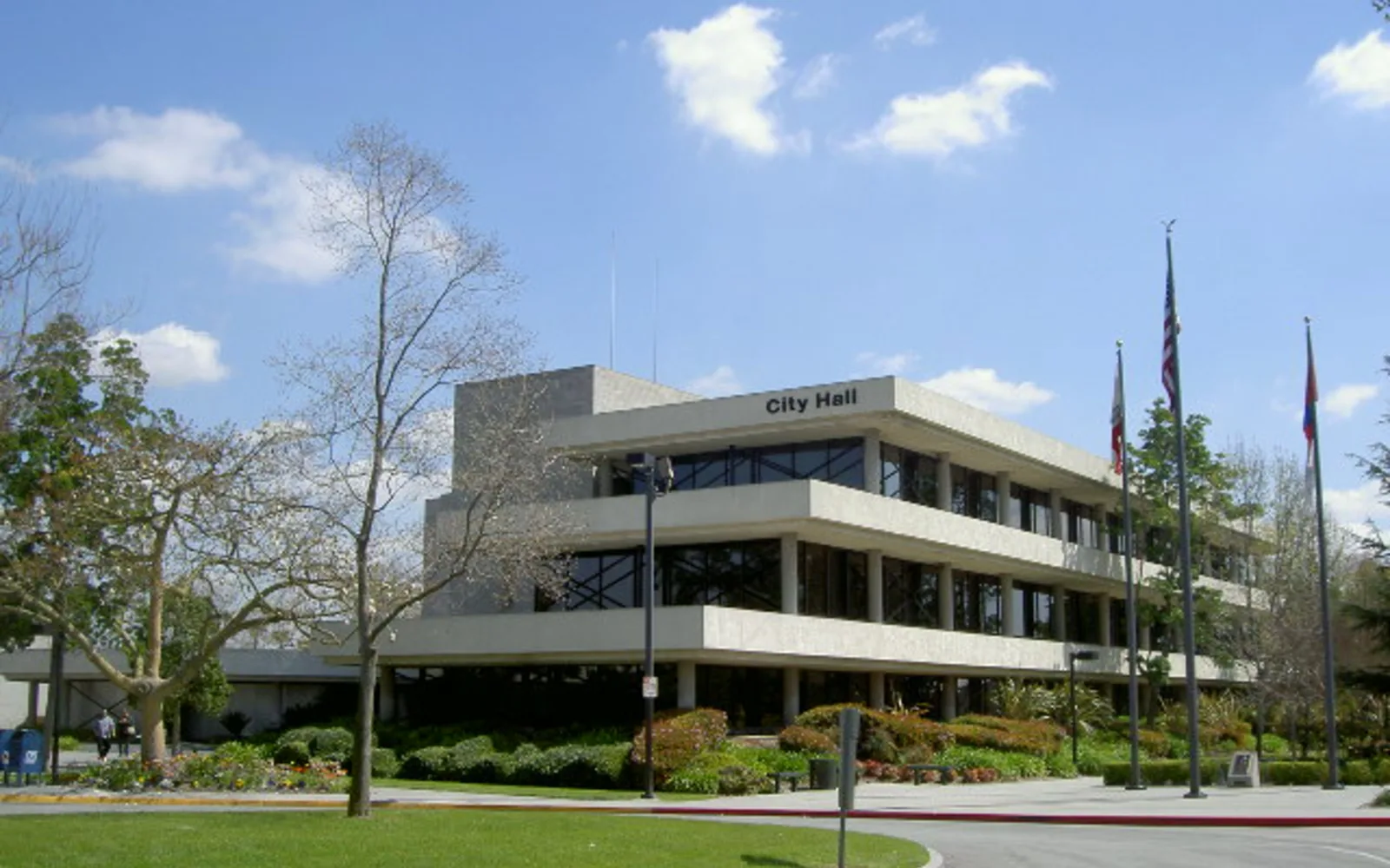 The Downey City Hall building with its civic architecture, representing the city's municipal government and community identity